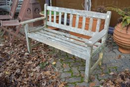 A hardwood garden bench.