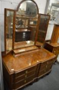 A walnut dressing chest.