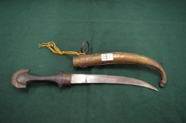 An Eastern Kindjal and scabbard.