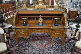 A large and impressive French design ormolu mounted and inlaid cylinder bureau.