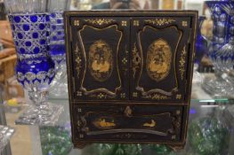 An early 20th century Japanese table top cabinet.