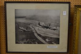 Two early photographic prints of aeroplanes.