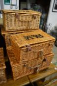 Four Fortnum and Mason wicker baskets.