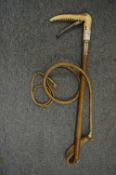 An unusual riding whip by Swaine & Adeney with silver collar, the stag antler handle incorporating a