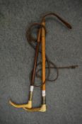 A silver mounted riding whip and a silver mounted riding crop.