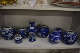 A group of Chinese prunus pattern ginger jars and vases.
