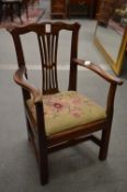 A miniature Georgian mahogany armchair.