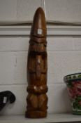 A carved wood totem.