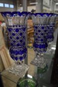 A large pair of Bohemian blue tinted cut glass pedestal brackets (small rim chips).