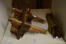 An old wood working moulding plane with blades.