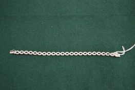 A good 18ct gold and diamond bracelet.