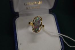 A 14ct gold and opal dress ring.