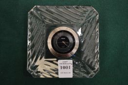 A cut glass desk clock.