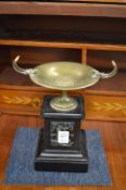 A good small pair of bronze tazza mounted on marble bases.