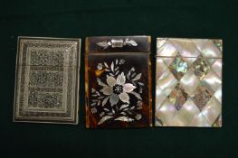 A Victorian mother of pearl calling card case and two others.