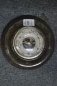 A serpentine barometer.