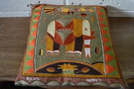 Mavis, an elephant in a landscape, embroidery picture as a cushion.