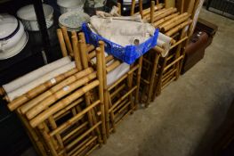 Quantity of bamboo directors style chairs.