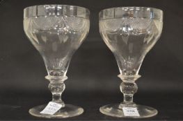 A good pair of large cut glass wine glasses.