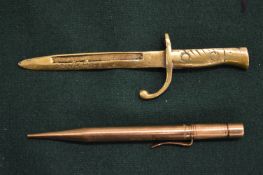9ct gold propelling pencil and a novelty letter opener modelled as a bayonet, stamped Anvers.