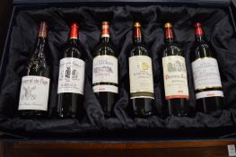A presentation boxed set of six bottles of French red wine.