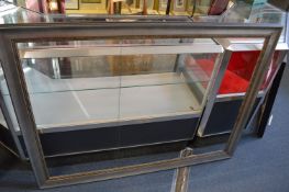 A modern silver effect frame, rebate size 130cm x 91.5cm.