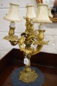 A good pair of Louis XVI style ormolu three branch candelabra.