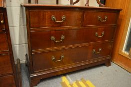 A mahogany straight front chest of drawers.