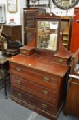 A Victorian walnut dressing chest.