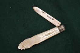 A silver and mother of pearl fruit knife.