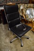 A leather and chrome office swivel armchair, possible Eames (af).