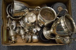 A group of silver trophy cups, various condiments etc.