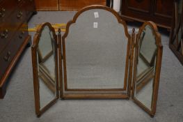 A mahogany three fold dressing table mirror.