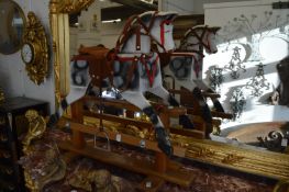 A small rocking horse.