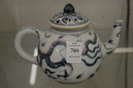 A Chinese blue, red and white decorated teapot.