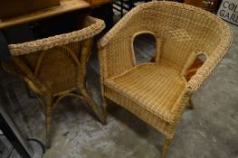 A pair of wicker chairs.