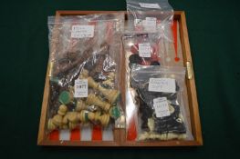Travelling commendation chess, draughts and backgammon board with accessories.