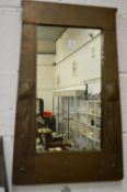 A Liberty & Co Arts and Crafts copper framed mirror.