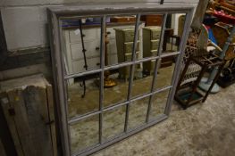 A large square shaped mirror with painted frame 120cm x 120cm.