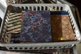 A collection of artists sketch books.