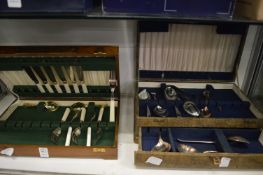 Two part canteens of cutlery.