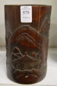 A Chinese carved bamboo brush pot.