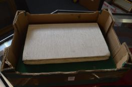 A collection of artists sketch books.