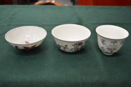 Three small Doucai style Chinese bowls.