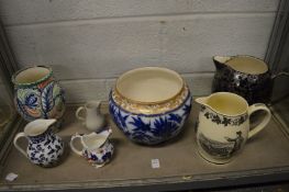 A large lustre decorated jug, blue and white jardiniere, reproduction cream ware jug and other