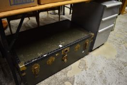 A trunk and a storage trolley.