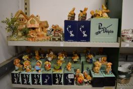 A large quantity of Pen Delfin figures, the majority with original boxes.