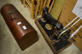 Two old sewing machines.