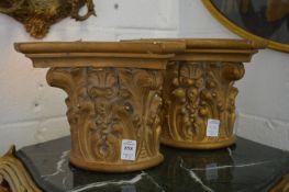 Decorative gilded ornamental items to include column capitals, cherubs and a decorative dish.