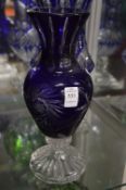 A Bohemian blue and clear cut glass vase.
